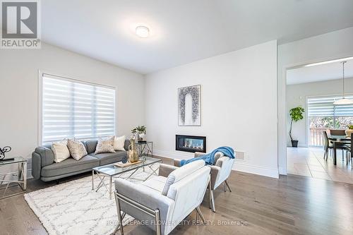 14 Richard Oxtoby Road, Caledon, ON - Indoor Photo Showing Living Room With Fireplace