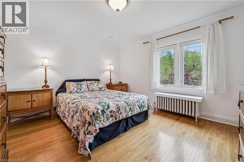 Hardwood flooring - 128 Wilhelm Street, Kitchener, ON - Indoor Photo Showing Bedroom