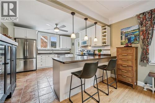 Bright kitchen with a door to the back deck - 128 Wilhelm Street, Kitchener, ON - Indoor Photo Showing Kitchen