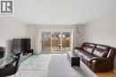 6384 Thornberry Crescent, Windsor, ON  - Indoor Photo Showing Living Room 