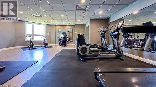 Spacious fitness area featuring recessed lighting, a drop-ceiling, and multiple large windows - 101 Shoreview Place Unit# 631, Stoney Creek, ON - Indoor Photo Showing Gym Room