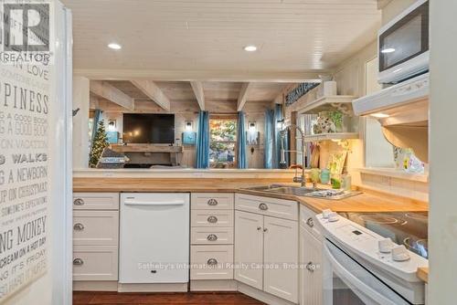5 - 1028 Oak Street, Muskoka Lakes (Medora), ON - Indoor Photo Showing Kitchen With Double Sink