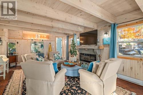 5 - 1028 Oak Street, Muskoka Lakes (Medora), ON - Indoor With Fireplace
