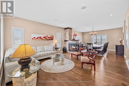 1453 Notre Dame Street, Russell, ON - Indoor Photo Showing Living Room With Fireplace