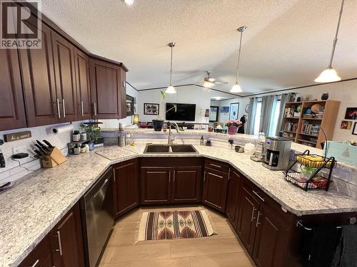 5506 Pine Crescent, Fort Nelson, BC - Indoor Photo Showing Kitchen