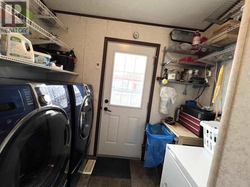 5506 Pine Crescent, Fort Nelson, BC - Indoor Photo Showing Laundry Room