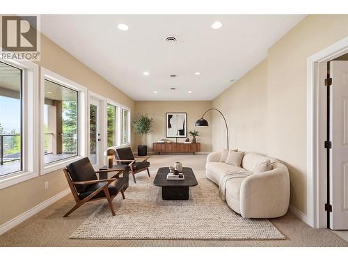 Lower level den-virtually staged with furniture - 448 Viewcrest Road, Kelowna, BC - Indoor