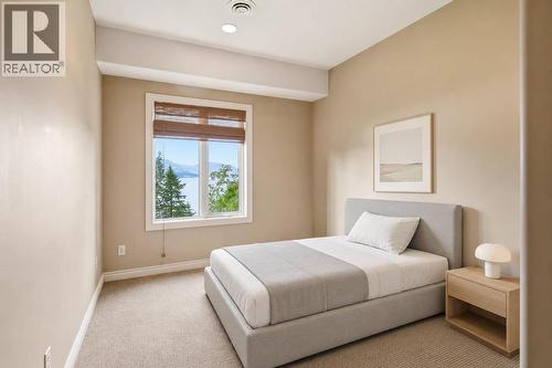 Bedroom 3- virtually staged furniture - 448 Viewcrest Road, Kelowna, BC - Indoor Photo Showing Bedroom