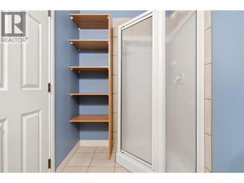 Lower level 3 piece bathroom with shower off the rec room - 448 Viewcrest Road, Kelowna, BC - Indoor