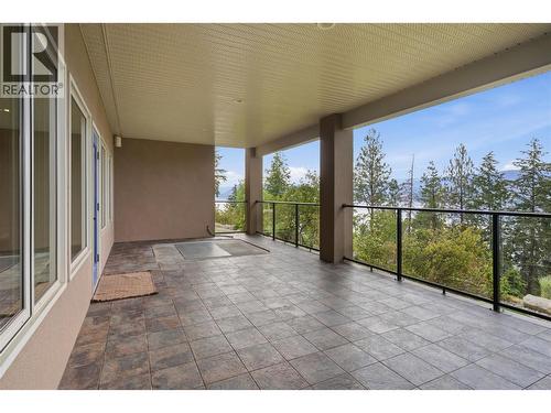 Lower level covered balcony- wired and ready for a hot tub! - 448 Viewcrest Road, Kelowna, BC - Outdoor With Balcony With Exterior
