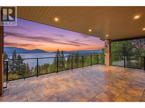 Gorgeous sunset views from the main floor balcony - 448 Viewcrest Road, Kelowna, BC - Outdoor With Body Of Water With View With Exterior