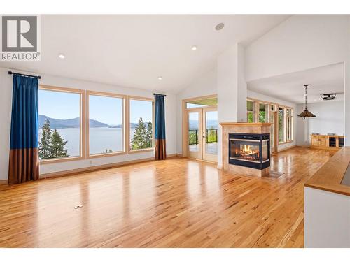 Living room - main floor - 448 Viewcrest Road, Kelowna, BC - Indoor Photo Showing Living Room With Fireplace