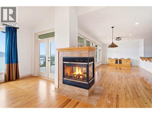 Living room- main floor - 448 Viewcrest Road, Kelowna, BC - Indoor Photo Showing Living Room With Fireplace