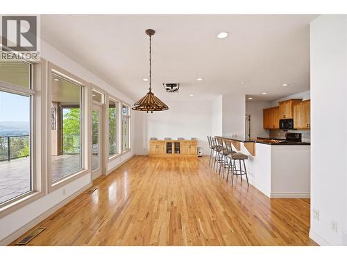 barstools are the only virtually staged furniture in this photo - 448 Viewcrest Road, Kelowna, BC - Indoor