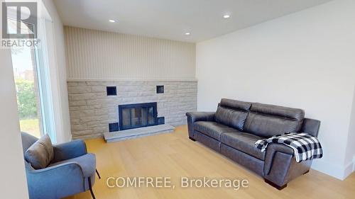 1357 Emerald Gate Avenue, Ottawa, ON - Indoor Photo Showing Living Room With Fireplace