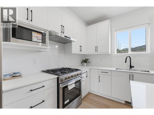 Stainless Steel appliances - 4601 97 Street Unit# 6, Osoyoos, BC - Indoor Photo Showing Kitchen With Double Sink With Upgraded Kitchen
