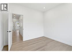 Primary Bedroom across the hallway for added privacy - 