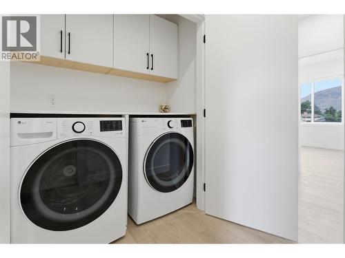 Laundry room on the same level as bedrooms for everyday convenience - 4601 97 Street Unit# 6, Osoyoos, BC - Indoor Photo Showing Laundry Room