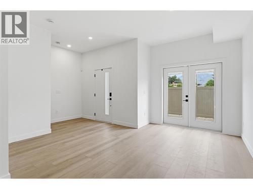 Additional rec room on the ground/lower floor with walk-out access - 4601 97 Street Unit# 6, Osoyoos, BC - Indoor Photo Showing Other Room
