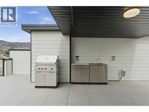 Outdoor kitchen and BBQ setup - 4601 97 Street Unit# 6, Osoyoos, BC - Outdoor With Exterior