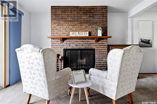 179 B-Say-Tah Road, B-Say-Tah, SK - Indoor Photo Showing Living Room With Fireplace