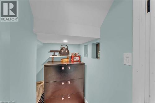 Built-in shelving unit with recessed lighting, integrated wall niches, and light blue wall finish - 139 Ferris Drive, Wellesley, ON - Indoor Photo Showing Other Room