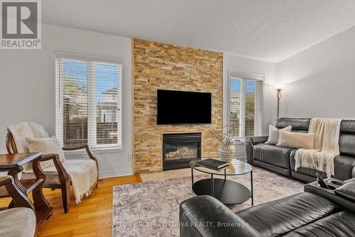 27 Nairn Street, Ottawa, ON - Indoor Photo Showing Living Room With Fireplace