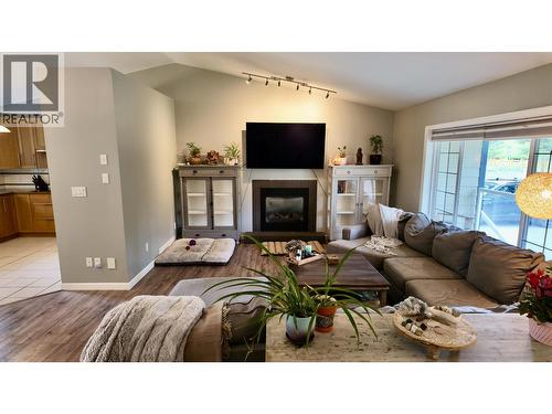 4838 Kitwanga Drive, 108 Mile Ranch, BC - Indoor Photo Showing Living Room With Fireplace