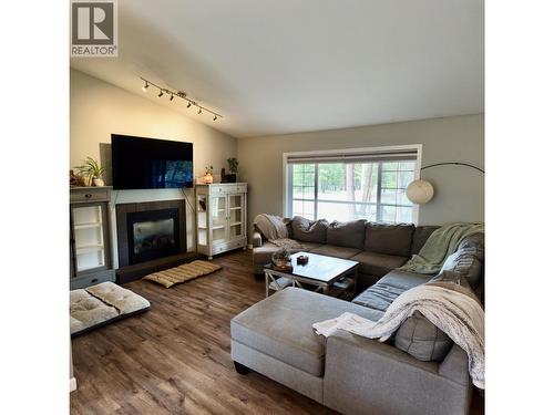 4838 Kitwanga Drive, 108 Mile Ranch, BC - Indoor Photo Showing Living Room With Fireplace