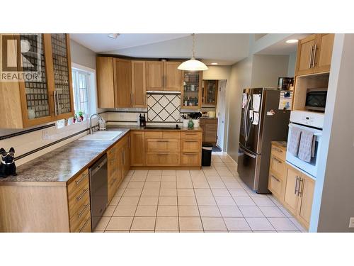4838 Kitwanga Drive, 108 Mile Ranch, BC - Indoor Photo Showing Kitchen With Double Sink
