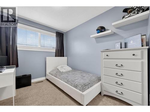 10911 Sherman Drive, Lake Country, BC - Indoor Photo Showing Bedroom