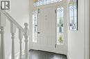 Entryway featuring a white paneled door with decorative leaded glass sidelights and transom window - 314 Hess Street S, Hamilton, ON  - Indoor Photo Showing Other Room 