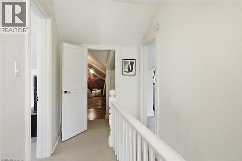 Hallway with light-toned wall paint and carpeted flooring - 314 Hess Street S, Hamilton, ON - Indoor Photo Showing Other Room