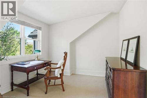 Room with neutral wall paint, sloped ceiling, and carpet flooring - 314 Hess Street S, Hamilton, ON - Indoor
