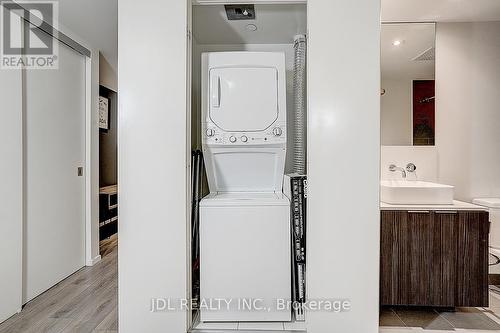 704 - 159 Dundas Street E, Toronto, ON -  Photo Showing Laundry Room