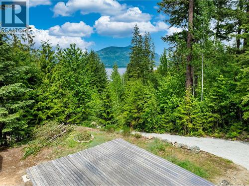 North facing lake and mountain view, view would increase if there was a 2 story home built here. - 3950 Short Road, Eagle Bay, BC 