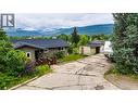 Front of the Home with large driveway - 2025 Catt Avenue, Lumby, BC  - Outdoor 