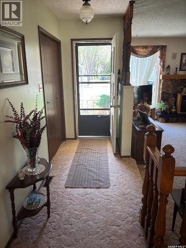 149 Garvin Crescent, Canora, SK - Indoor Photo Showing Other Room With Fireplace