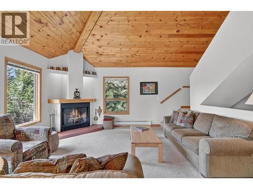 1067 Timberhill Place, Windermere, BC - Indoor Photo Showing Living Room With Fireplace