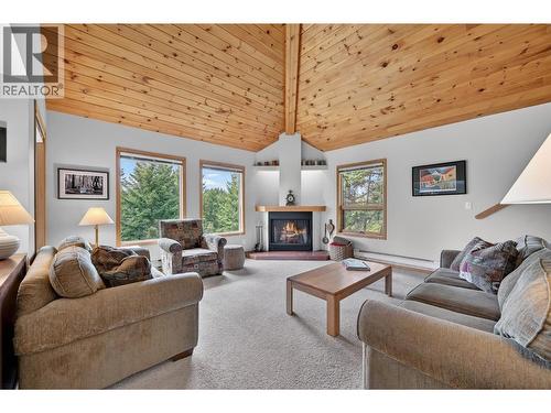 1067 Timberhill Place, Windermere, BC - Indoor Photo Showing Living Room With Fireplace