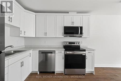 Unit #9B - 600 Second Street E, Cornwall, ON - Indoor Photo Showing Kitchen With Double Sink
