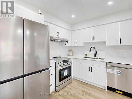 16 Mount Fuji Crescent, Brampton, ON - Indoor Photo Showing Kitchen With Double Sink