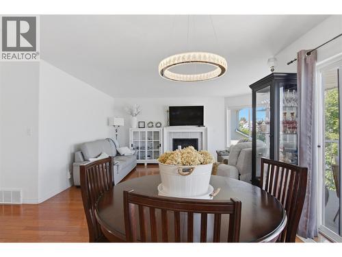 87 Thor Drive, Kamloops, BC - Indoor Photo Showing Dining Room With Fireplace