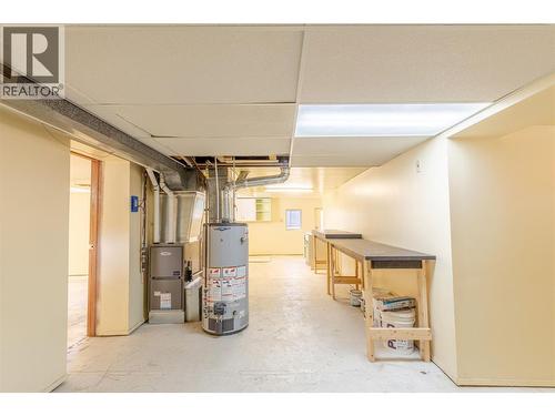 New Gas Furnace and Gas Hot Water Tank - 710 Devon Street, Creston, BC - Indoor Photo Showing Basement