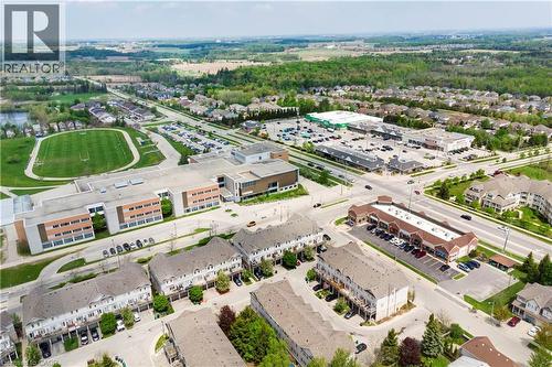 Aerial landscape showcasing a mixed-use residential and commercial district - 619 Wild Ginger Avenue Unit# C15 & #C16, Waterloo, ON - Outdoor With View