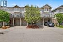 Three-story townhome featuring light-colored siding and a multi-level design - 619 Wild Ginger Avenue Unit# C15, Waterloo, ON  - Outdoor 