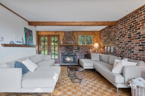 Living Room - 891 Ch. Du Moulin, Sainte-Adèle, QC - Indoor Photo Showing Living Room With Fireplace