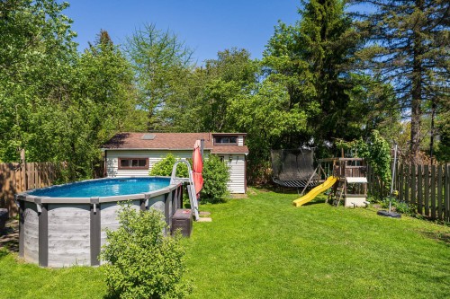 Cour - 35 Av. Victoria, Pointe-Claire, QC - Outdoor With Above Ground Pool