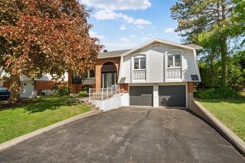 Façade - 18 Rue Mansfield, Dollard-Des-Ormeaux, QC - Outdoor