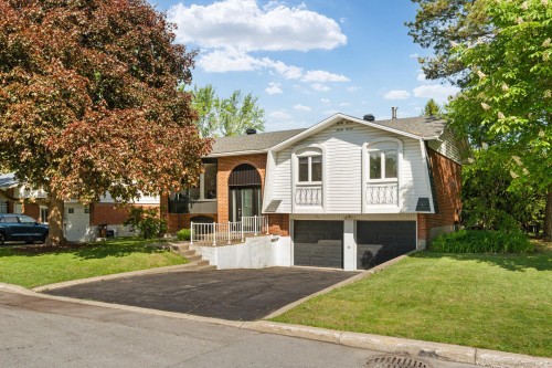 Façade - 18 Rue Mansfield, Dollard-Des-Ormeaux, QC - Outdoor